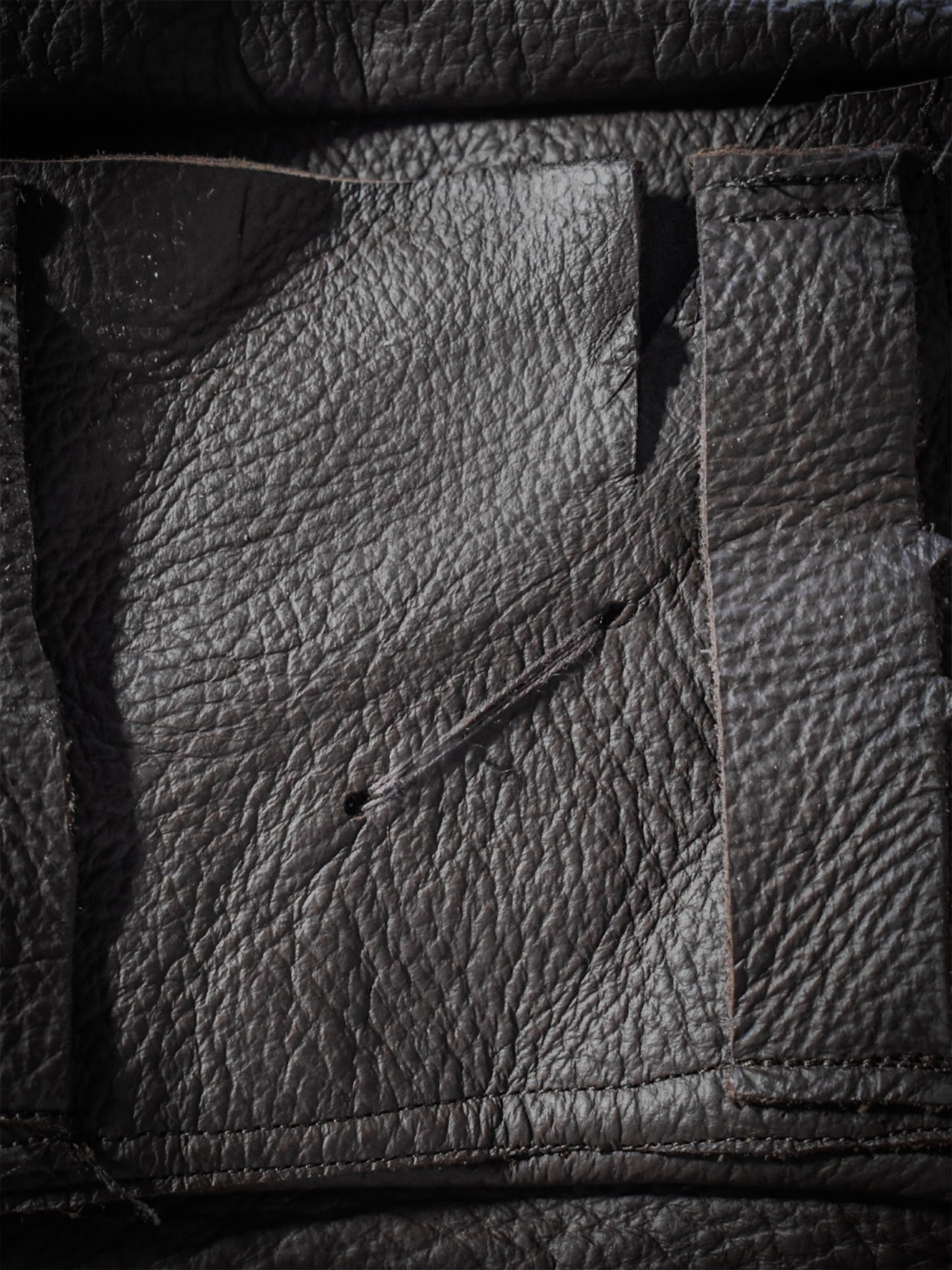 BROWN LEATHER BELT BAG WITH CHARM